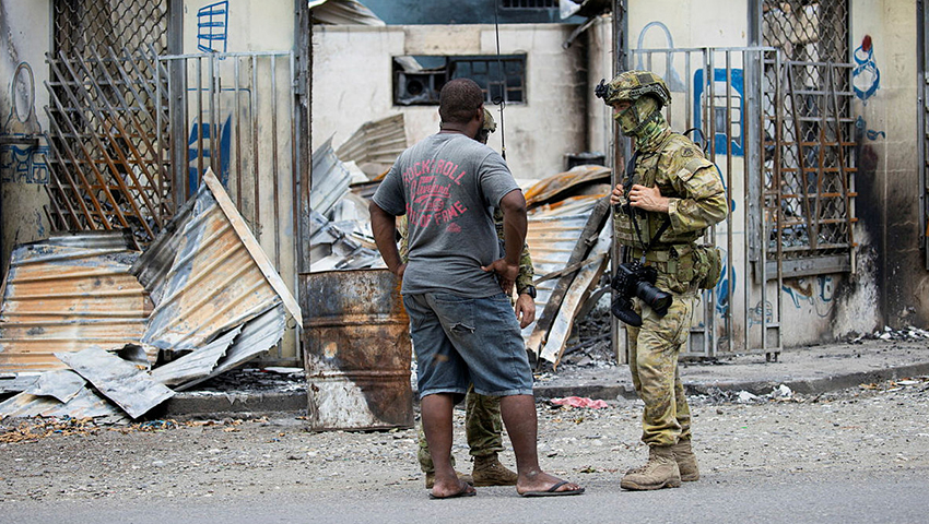 Is there a geopolitical undercurrent stirring tensions in the Solomon Islands?