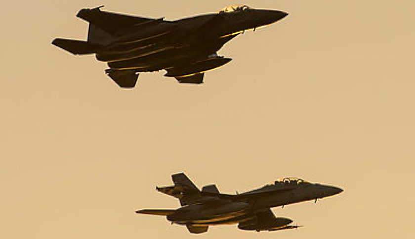 a mixed formation of a rsaf f    sqn fa  f super hornet fly a public display over mindil beach darwin