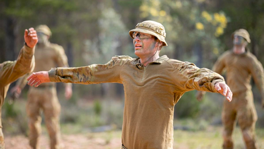 Staff Cadet Nathan Gould conducts star-jumps during a PT session on Exercise Shaggy Ridge at Majura Training Area in Canberra, ACT. Photo: Corporal Robert Whitmore