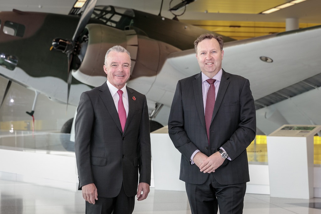 dr brendan nelson and greg barsby in front of the hudson bomber at canberra