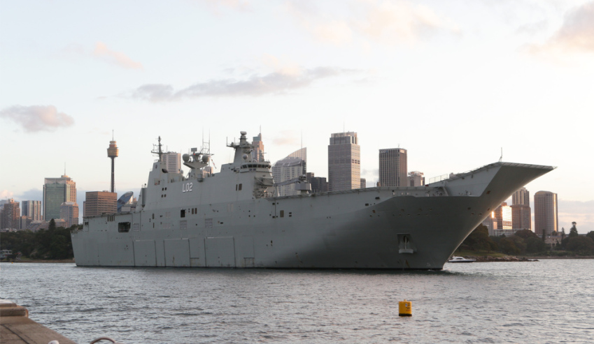 HMAS Canberra docks at homeport after five-month deployment